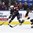 PLYMOUTH, MICHIGAN - APRIL 6: USA's Brianna Decker #14 looks to make a pass while Germany's Nina Kamenik #7 defends during semifinal round action at the 2017 IIHF Ice Hockey Women's World Championship. (Photo by Matt Zambonin/HHOF-IIHF Images)

